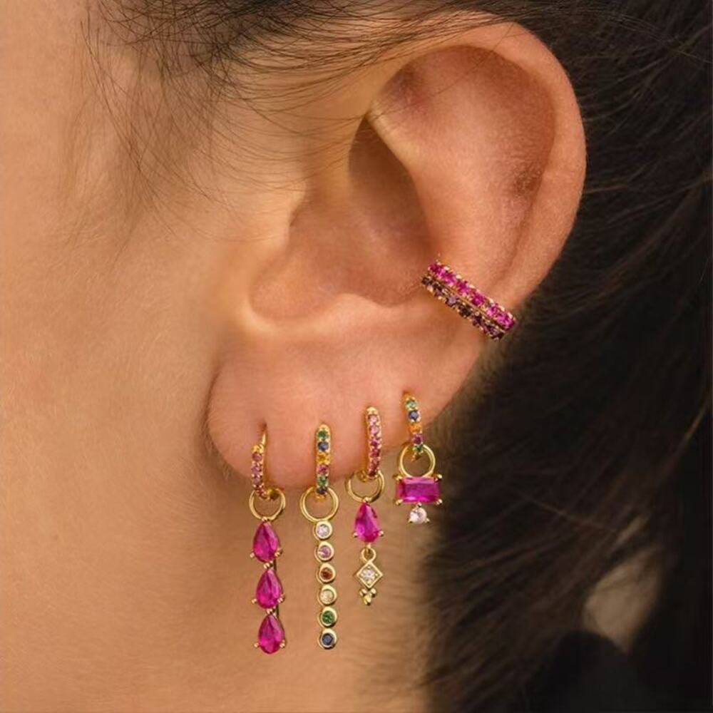 Open U-arch earrings with a hollow petal motif. - Picture 2 of 4
